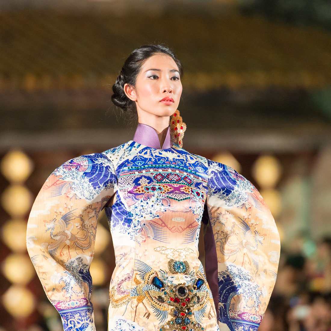 Model wearing a  Vietnamese dress during the Oriental Night at Hue Festival 2014, Thua ThienâHue Province, Viet Nam, Indochina, South East Asia.