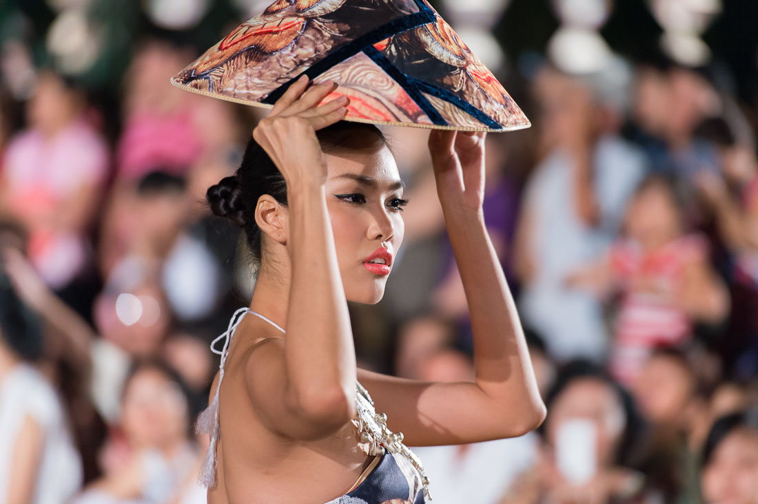 Model wearing a  Vietnamese dress during the Oriental Night at Hue Festival 2014, Thua ThienâHue Province, Viet Nam, Indochina, South East Asia.