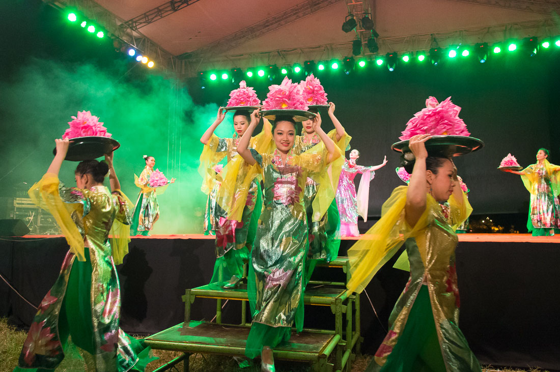 Vietnamese artists wearing the traditional dress, the ao dai, performing at Hue Festival 2014, Thua ThienâHue Province, Viet Nam, Indochina, South East Asia.