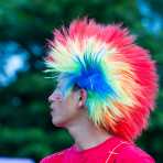 A stilt walker, wearing a colorful hat during the Hue Festival 2014, Thua ThienâHue Province, Viet Nam, Indochina, South East Asia.