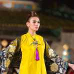 Model wearing a  Vietnamese dress during the Oriental Night at Hue Festival 2014, Thua ThienâHue Province, Viet Nam, Indochina, South East Asia.