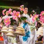 Vietnamese models wearing the traditional dress, the ao dai, during the Oriental Night at Hue Festival 2014, Thua ThienâHue Province, Viet Nam, Indochina, South East Asia.