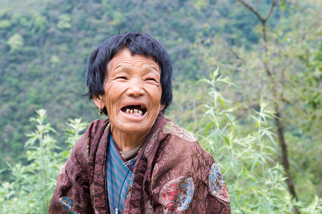 Old woman in the countryside, Kingdom of Bhutan, Asia