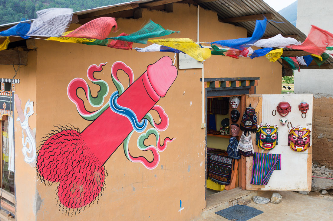 A large and colorful penis, a sign of happiness, painted on the wall of a souvenir store. Kingdom of Bhutan, Asia