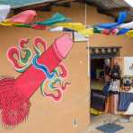 A large and colorful penis, a sign of happiness, painted on the wall of a souvenir store. Kingdom of Bhutan, Asia