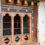 Traditional Bhutanese windows at Punakha Dzong, Kingdom of Bhutan, Asia