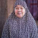 Old Cham Muslim woman wearing her hijab, happily smiling, Sen Monorom, Mondulkiri province. Kingdom of Cambodia, Indochina, South East Asia
