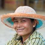 Beautiful woman smiling at the Sra Em market, Siem Reap province. Kingdom of Cambodia, Indochina, South East Asia