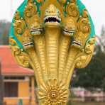 Bhuddist sacred figure, the snake, Naca, at the entrance of the pagoda (temple). Kingdom of Cambodia, Indochina, South East Asia