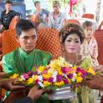 The groom and the bride at their wedding cerimony in rural Cambodia, wearing the traditional costume. Kingdom of Cambodia, Indochina, South East Asia