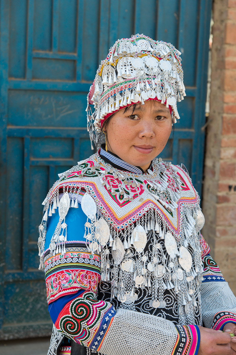 A woman from the Yi ethnic minority people in traditional costume, on her wedding day. Sha La Tuo town, Yuan Yang County, Yunnan Province, China, Asia. Nikon D4, 24-120mm, f/4.0, VR