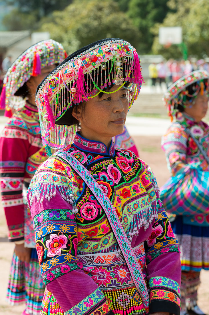 A woman from the Miao ethnic minority people wearing the traditional costume. Mao Jie village, Wuding County, Yunnan Province, China, Asia. Nikon D4, 24-120mm, f/4.0, VR