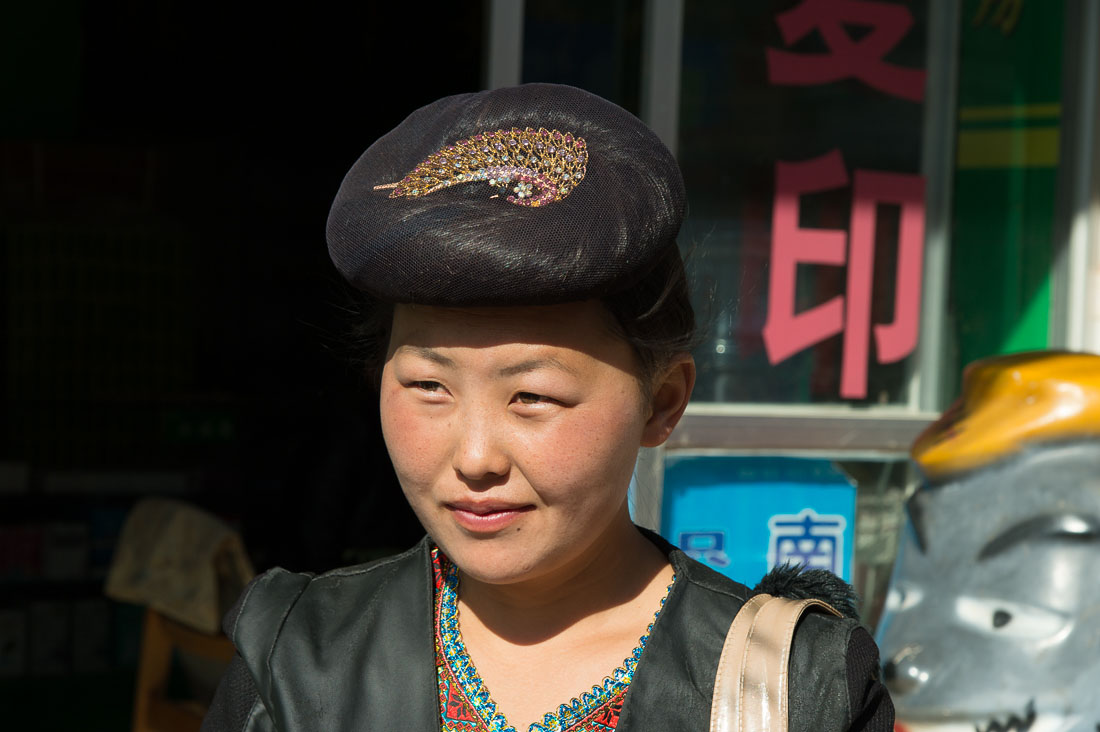 A traditional hair arrangement from the women of the Flower Miao ethnic minority people. Mao Jie village, Wuding County, Yunnan Province, China, Asia. Nikon D4, 24-120mm, f/4.0, VR