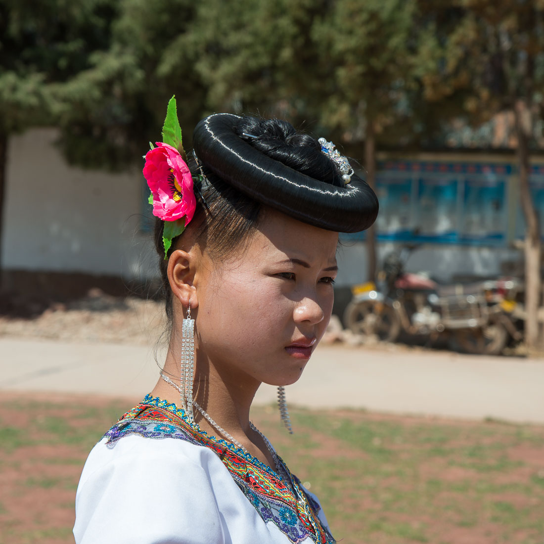 A traditional hair arrangement from the women of the Flower Miao ethnic minority people. Mao Jie village, Wuding County, Yunnan Province, China, Asia. Nikon D4, 24-120mm, f/4.0, VR