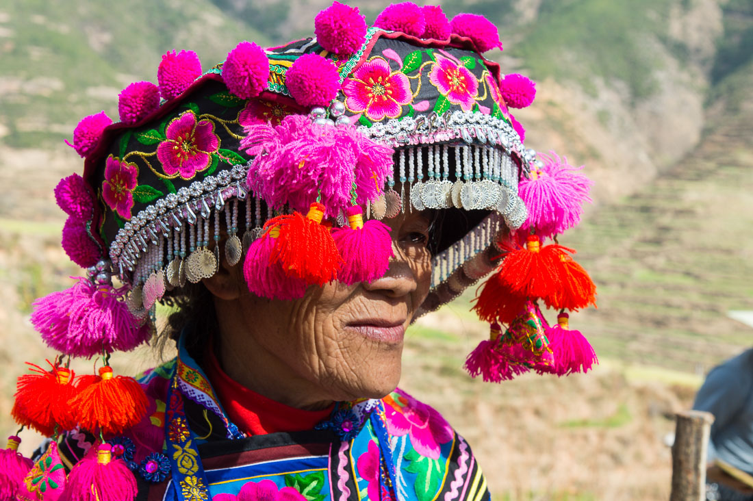 Colorful hat from the Yi ethnic minority people, at the annual festival in Zhi Ju village. Yong Ren County, Yunnan Province, China, Asia. Nikon D4, 24-120mm, f/4.0, VR