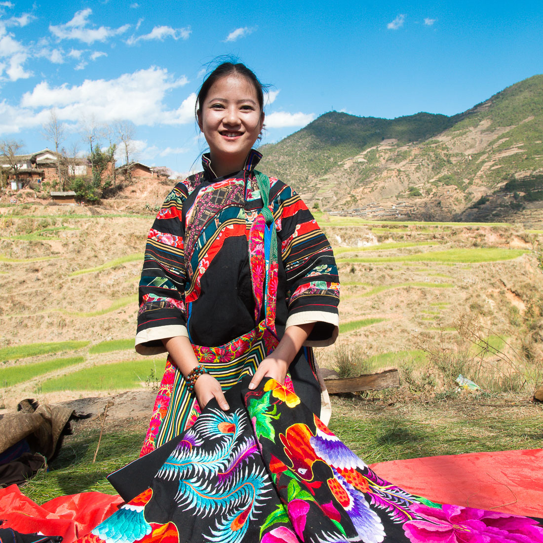 Colorful costumes of the Yi ethnic minority people, at the annual festival in Zhi Ju village. Yong Ren County, Yunnan Province, China, Asia. Nikon D4, 24-120mm, f/4.0, VR