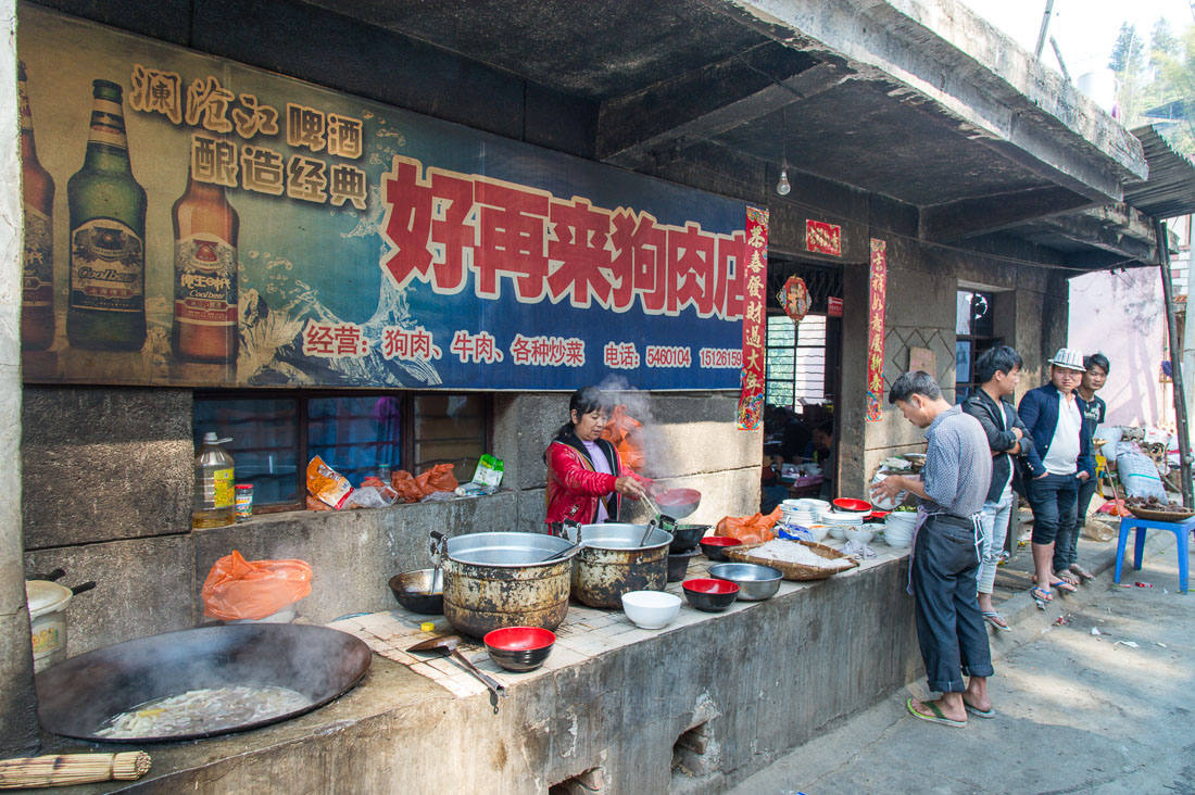 A restaurant specialized in beef and dog meat, this what the sign say! Loa Ji Zhat town in the remote south of the Yunnan province, China, Asia. Nikon D4, 24-120mm, f/4.0, VR
