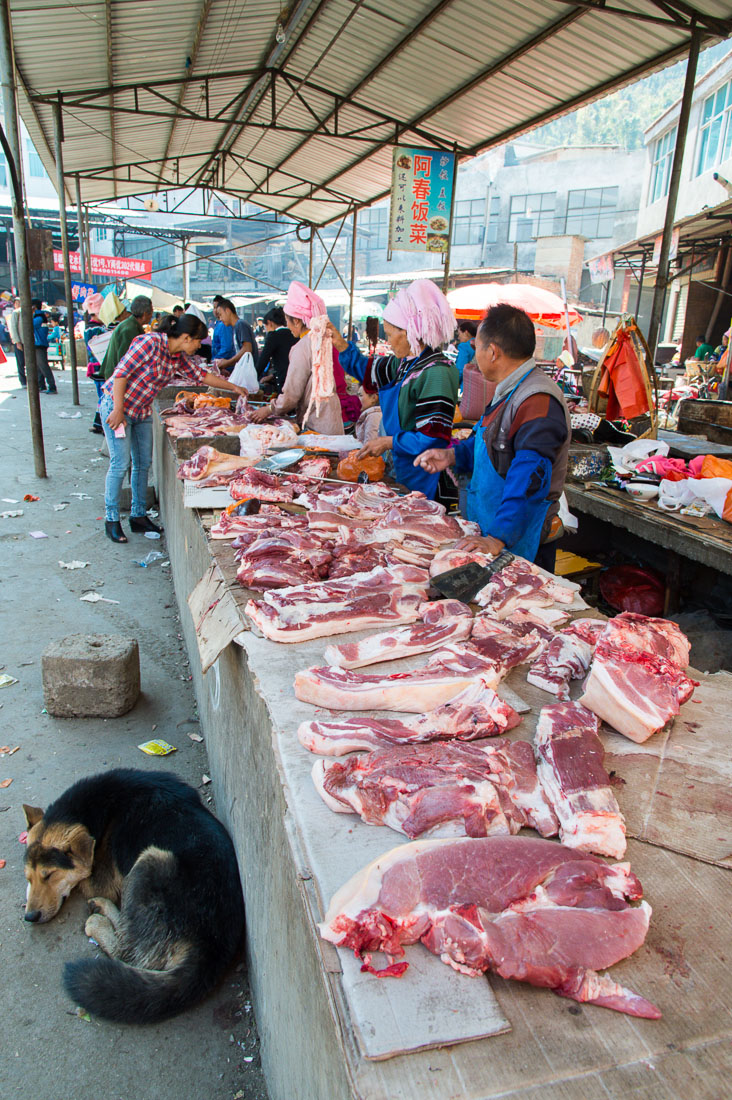 The pork meat section at the Jia Yin market in the south of the Yunnan Province, China, Asia. Nikon D4, 24-120mm, f/4.0, VR