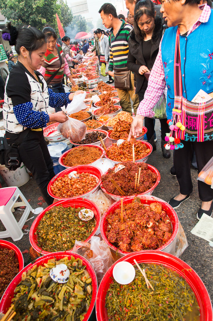 Selling spiced produce at the Lan Cang market, Yunna Province, China, Asia. Nikon D4, 24-120mm, f/4.0, VR