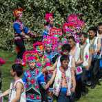 Boys and girls from the Yi ethnic minority people, in traditional colorful costume, performing at the annual festival in Zhi Ju village, Yong Ren County, Yunnan Province, China, Asia. Nikon D4, 70-200mm, f/2.8, VR II