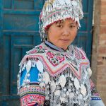 A woman from the Yi ethnic minority people in traditional costume, on her wedding day. Sha La Tuo town, Yuan Yang County, Yunnan Province, China, Asia. Nikon D4, 24-120mm, f/4.0, VR