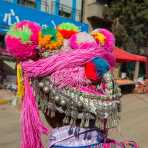 A colorful hat part of the traditional costume worn by the women from the Yi ethnic minority people. Mao Jie village, Wuding County, Yunnan Province, China, Asia. Nikon D4, 24-120mm, f/4.0, VR