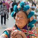 Old woman from the Yi ethnic minority people at the market in Mao Jie village, Wuding County, Yunnan Province, China, Asia. Nikon D4, 24-120mm, f/4.0, VR