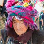 An old woman from the Yi ethnic minority people, wearing the traditional costume at the annual festival in Zhi Ju village. Yong Ren County, Yunnan Province, China, Asia. Nikon D4, 24-120mm, f/4.0, VR