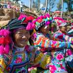 Colorful costumes of the Yi ethnic minority people, at the annual festival in Zhi Ju village. Yong Ren County, Yunnan Province, China, Asia. Nikon D4, 24-120mm, f/4.0, VR