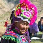 Colorful costume of the Yi ethnic minority people, at the annual festival in Zhi Ju village. Yong Ren County, Yunnan Province, China, Asia. Nikon D4, 24-120mm, f/4.0, VR