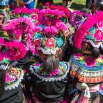 Colorful costumes of the Yi ethnic minority people, at the annual festival in Zhi Ju village. Yong Ren County, Yunnan Province, China, Asia. Nikon D4, 24-120mm, f/4.0, VR