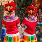 Colorful costumes of the Yi ethnic minority people, at the annual festival in Zhi Ju village. Yong Ren County, Yunnan Province, China, Asia. Nikon D4, 24-120mm, f/4.0, VR