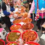 Selling spiced produce at the Lan Cang market, Yunna Province, China, Asia. Nikon D4, 24-120mm, f/4.0, VR