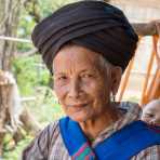 Woman from the Yao people ethnic minority wearing the traditional turban in Nan Mai village, Luang Namtha province, Lao PDR, Indochina, South East Asia