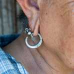 Woman from the Yao people ethnic minority wearing the traditional silver earrings in Nan Mai village, Luang Namtha province, Lao PDR, Indochina, South East Asia