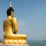 Colossal staue of Buddha at Phousalao temple in Pakse, Champasak province.  Lao PDR, Laos, Indochina, South East Asia