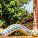 Bhuddist sacred figure, the snake, Naca, at the entrance of the pagoda, Vientiane province. Lao PDR, Laos, Indochina, South East Asia