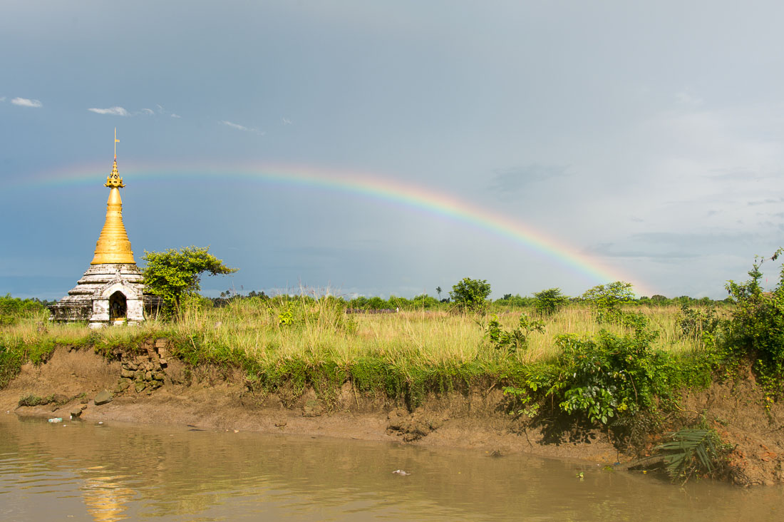 Rainbow and stupa on the Kaladan river, Rakhine State, Mynmar, Indochina, South East Asia.