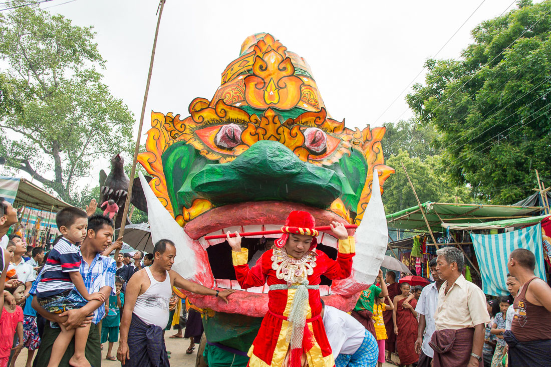 Traditional figure dancing during popular celebration  in Manhua Village, Myanmar, Indochina, South East Asia