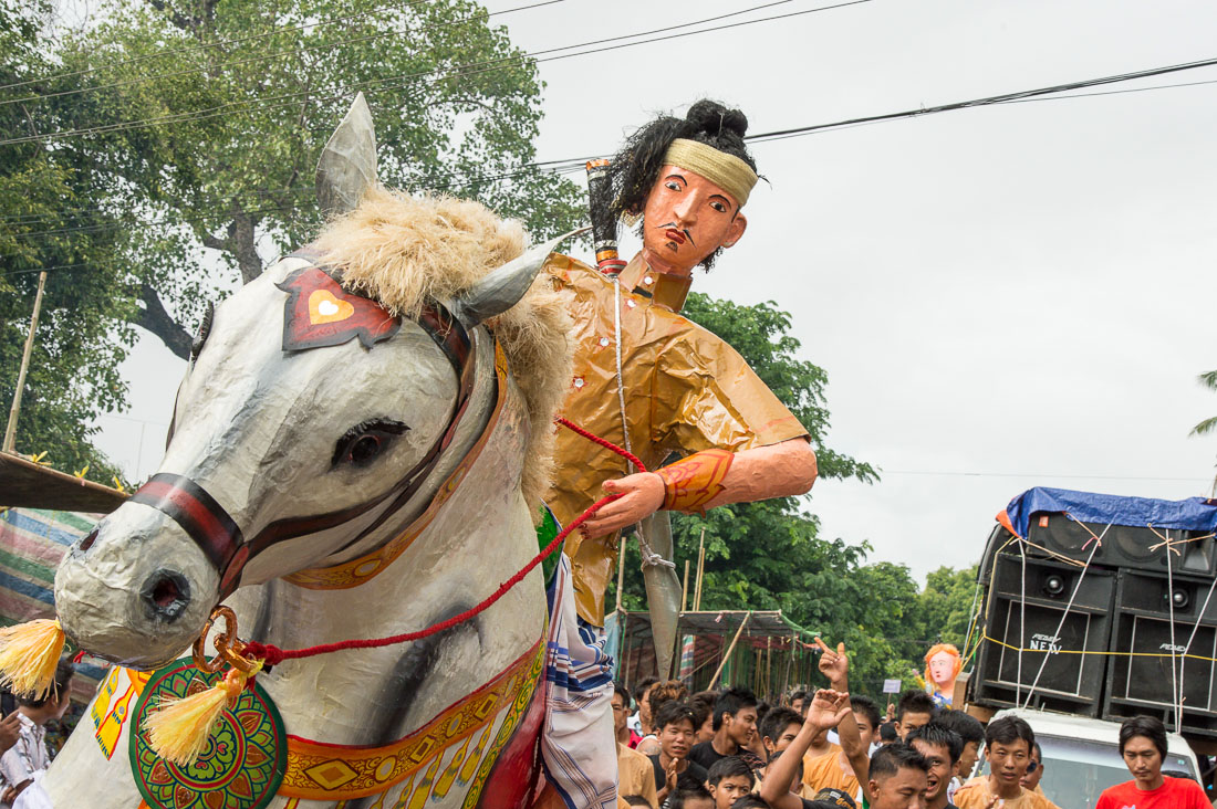 Animated paper mache figures during a popular celebration, Manhua Village, Myanmar, Indochina, South East Asia