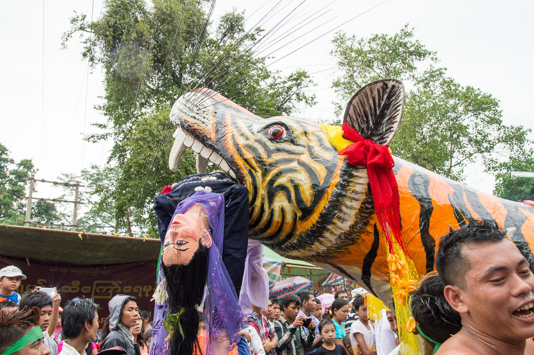 Animated paper mache figures during a popular celebration, Manhua Village, Myanmar, Indochina, South East Asia