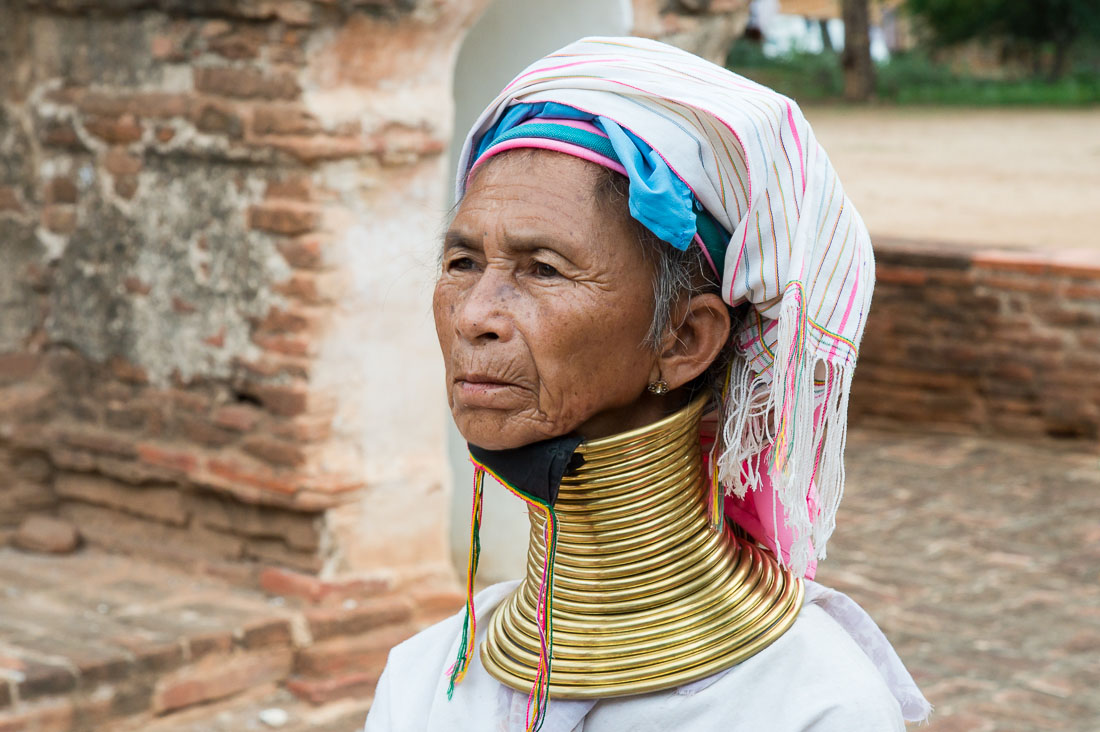 Woman from the Kayan people ethnic minority, known as 'giraffe women' because of  their elongated neck caused by the brass coils they wear since children. Bagan, Mandalay Province, Myanmar, Indochina, South East Asia.