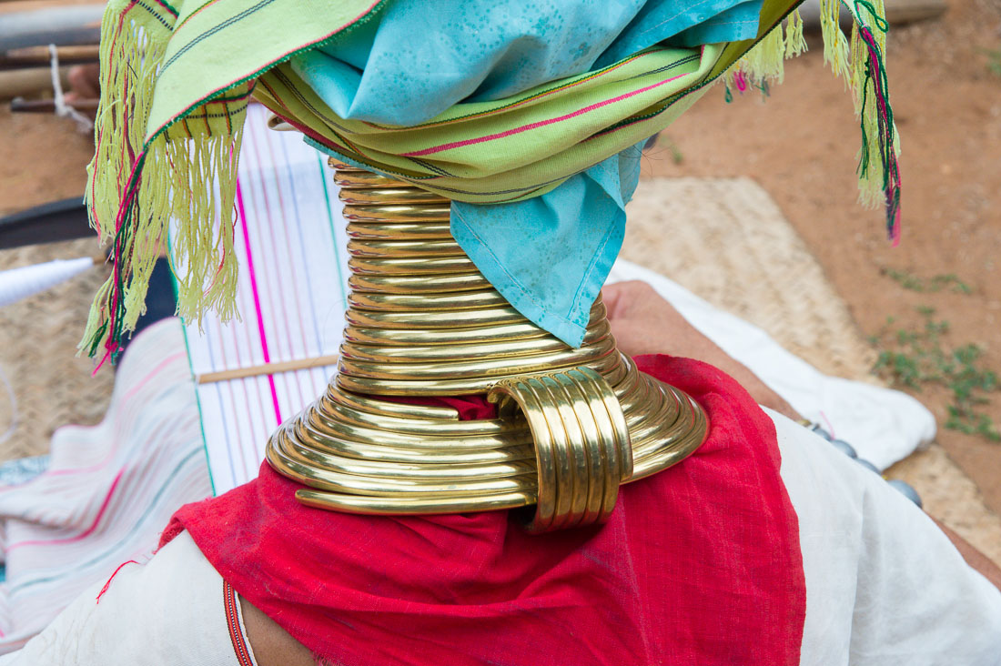 Woman from the Kayan people ethnic minority, known as 'giraffe women' because of  their elongated neck caused by the brass coils they wear since children. Bagan, Mandalay Province, Myanmar, Indochina, South East Asia.