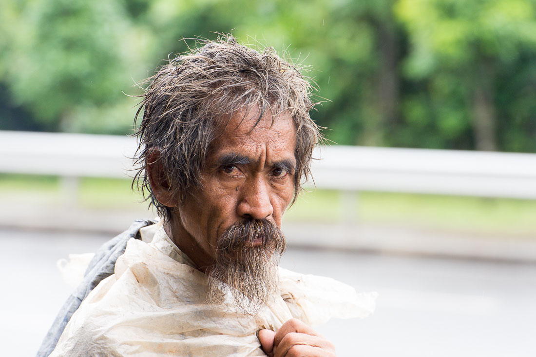 Homeless walking downtown Yangon, Myanmar, Indochina, South East Asia.