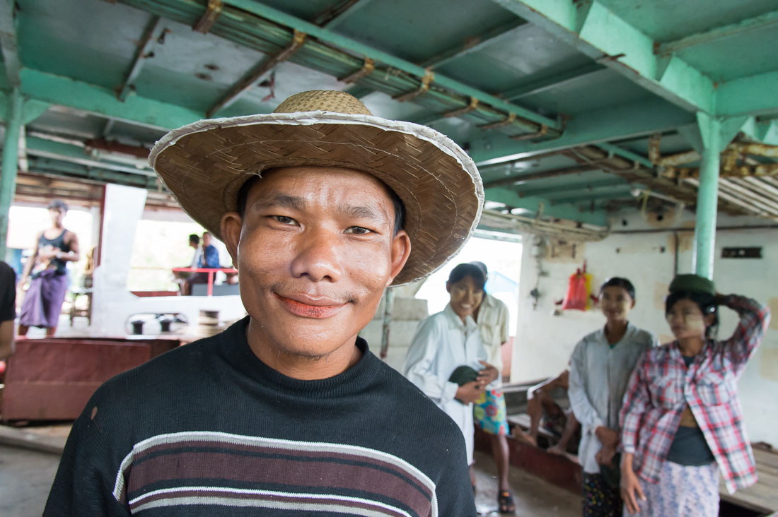 Man working on a small ship, Sittwe, Rakhine State, Myanmar, Indochina, South East Asia