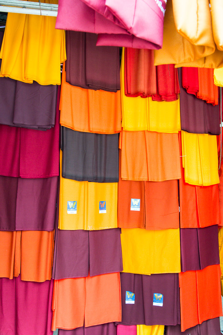 A store dedicated to Buddhist monks, displaying robes, Yangon, Myanmar, Indochina, South East Asia.