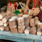 Roots used to prepare Tha Nat Khar a natural cosmetic most Burmese women and man put on their face and arms for sun protection. Market in Sittwe, Rakhine State, Myanmar, Indochina, South Easr Asia.