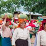 Women from the Pao people ethnic minorit group, bringing offer to the Buddhist monastery in Pattu village, Shan State, Myanmar, Indochina, South East Asia.