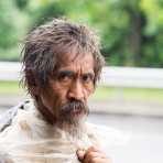 Homeless walking downtown Yangon, Myanmar, Indochina, South East Asia.