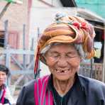 An old woman from the Pao people ethnich minority group, having good time at the market in Taunggyi the capital of the Shan State, Myanmar, Indochina, South East Asia.